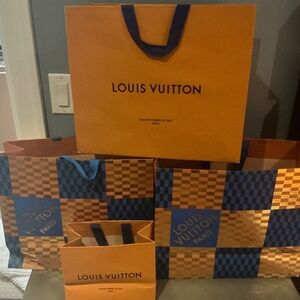 Four Original Louis Vuitton bags.
